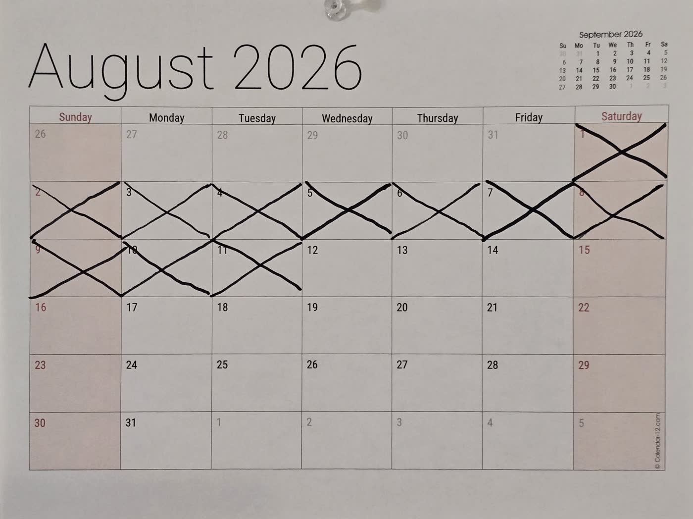 The August 2026 wall calendar with the first eleven days of the fast crossed off