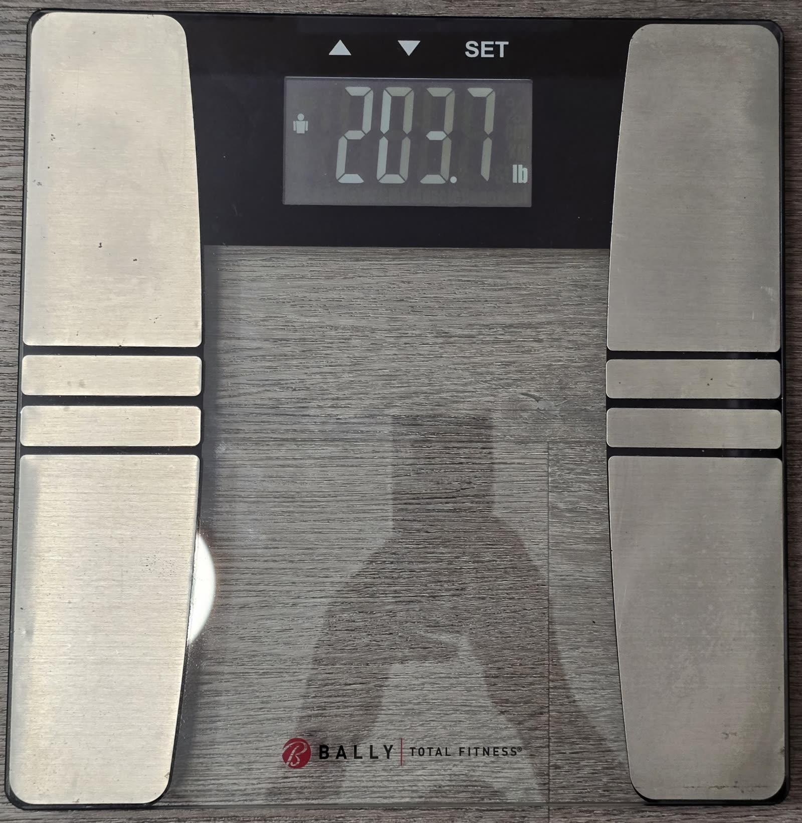 The scale on day 16 morning reading 203.7 pounds