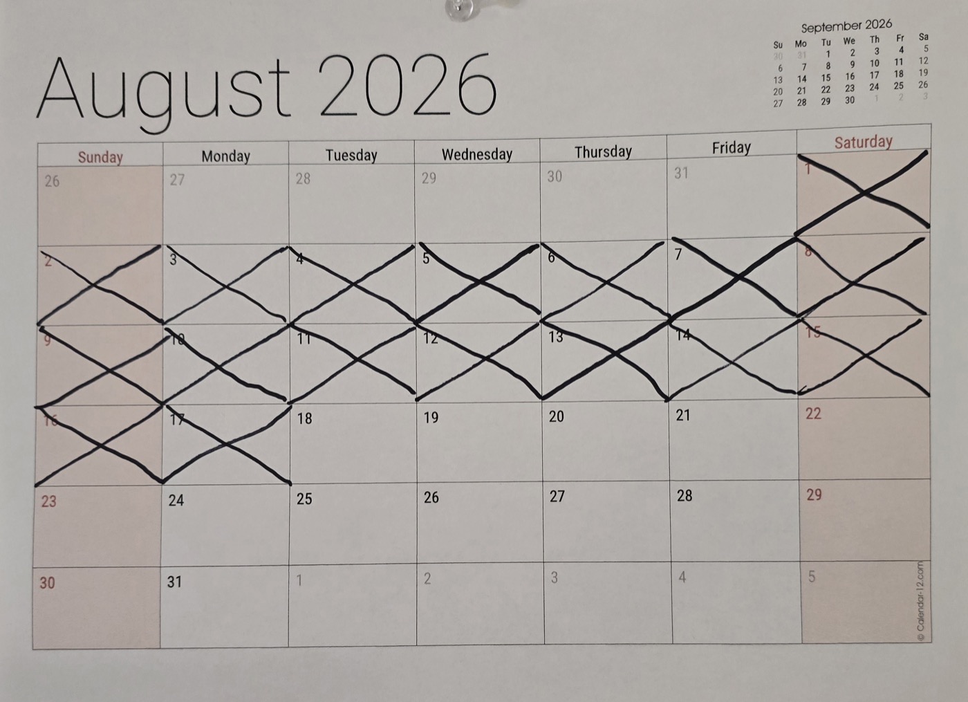 The wall calendar with seventeen days crossed off