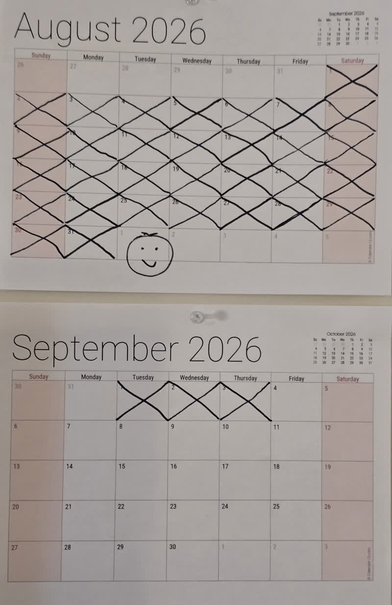The wall calendar with September 3 crossed off