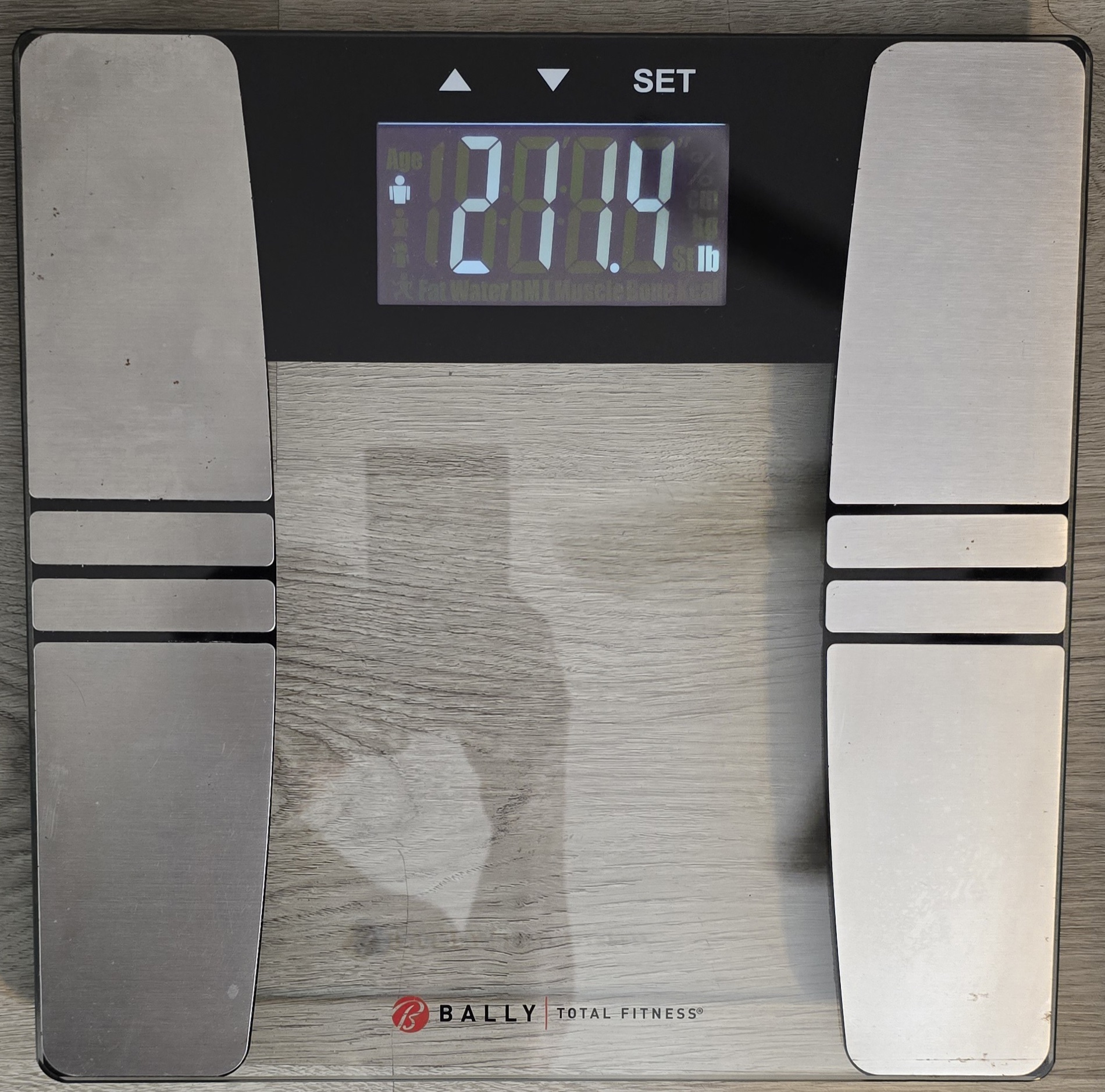 Bathroom scale on the morning of day 8 of the water fast reading 211.4 pounds, the 168 hour mark